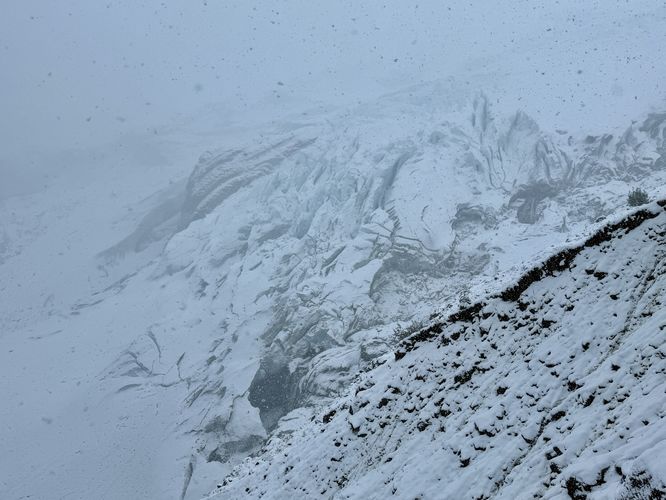 View of Coleman Glacier with two waterfalls cascading within