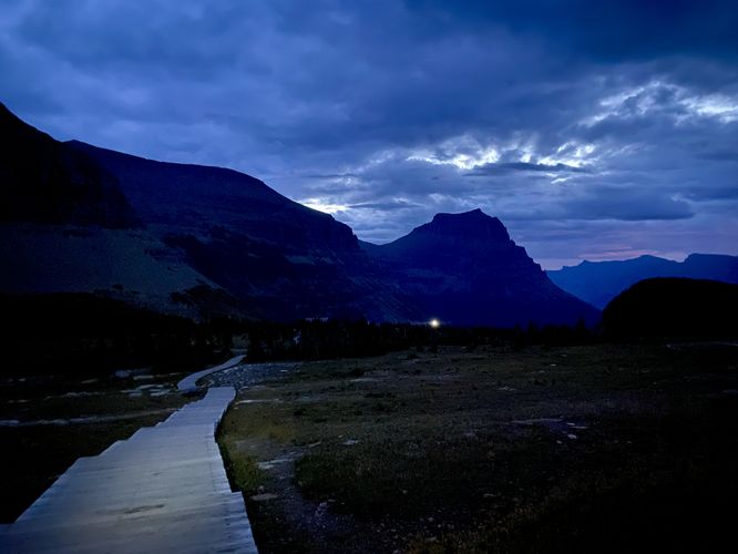 Boardwalk of the trail with a view looking east from Logan Pass