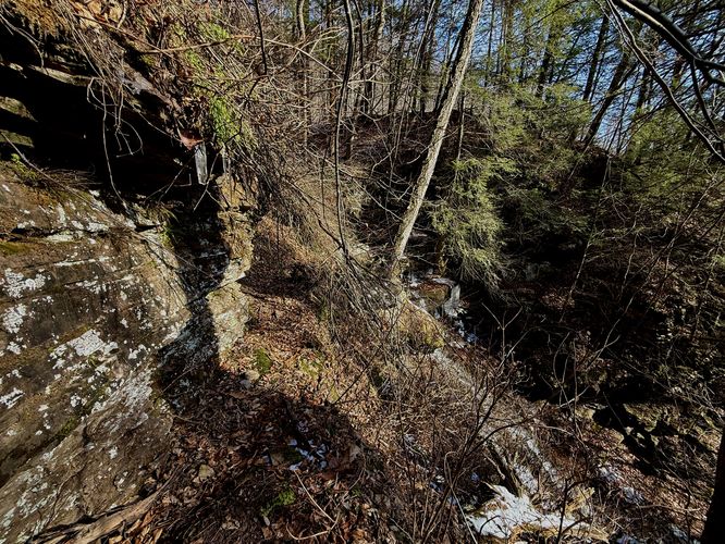Ledge leads to a view of High Rock Falls (can be sketchy)