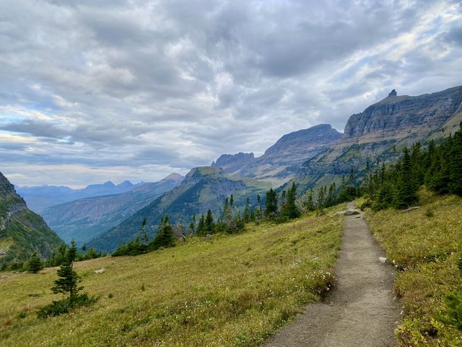 Hiking down Logan Pass along the Highline