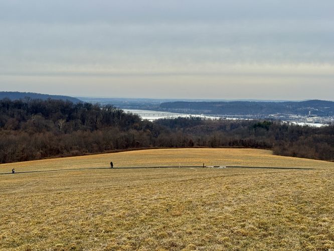 Visitors walk the universal access trail up to Highpoint