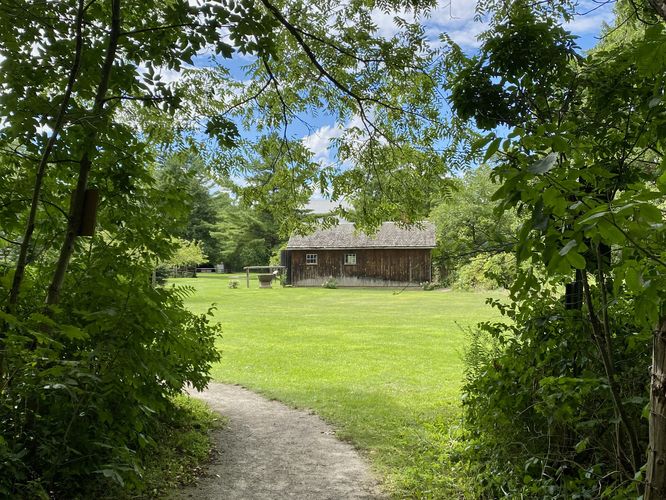 Trail enters the cultural village area