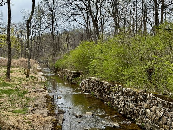 Antietam Creek flows through a stonework channel originally built in 1899