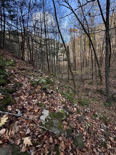 Steep, loose rocks lead up to the old quarry trail