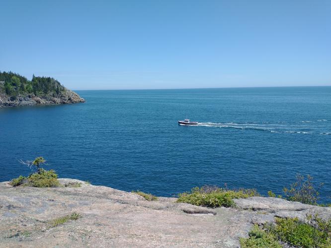 View of Lobster Boat entering Hunters Beach Cove to check their traps