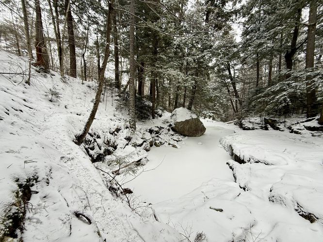 Trail follows a sketchy 10-foot tall ledge