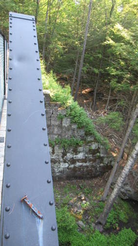 Old rail road nail and granite bridge abutments