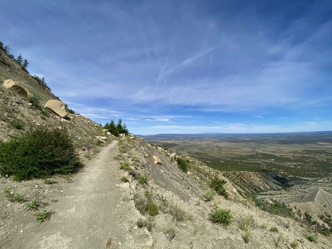Trail follows a steep sloped-landslide ara