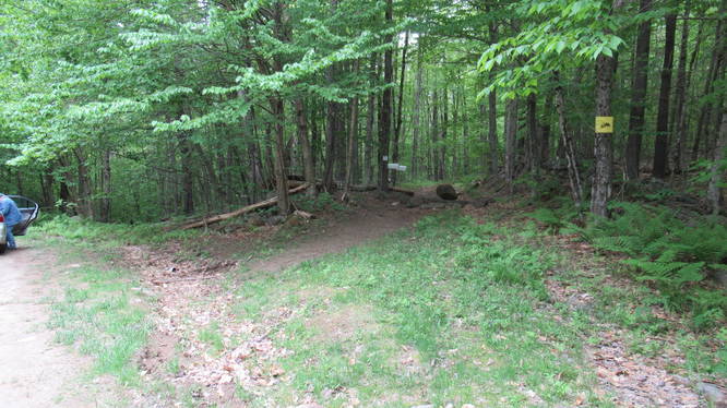 Trailhead off the side of the parking area