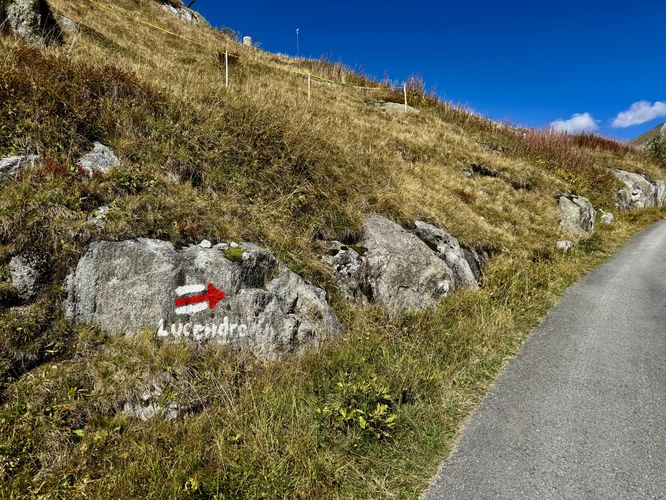 Moderate hike up to the dam begins. Follow Swiss trail blazes