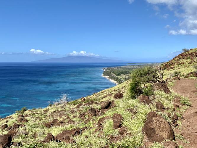 View of Lanai and turquoise-colored Hawaiian ocean below