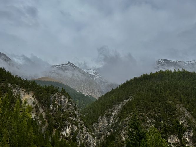 View of towering alpine mountains that surround Swiss National Park