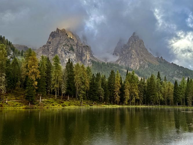 View of illuminated alpine peaks of the Italian Alps at Lago d'Antorno