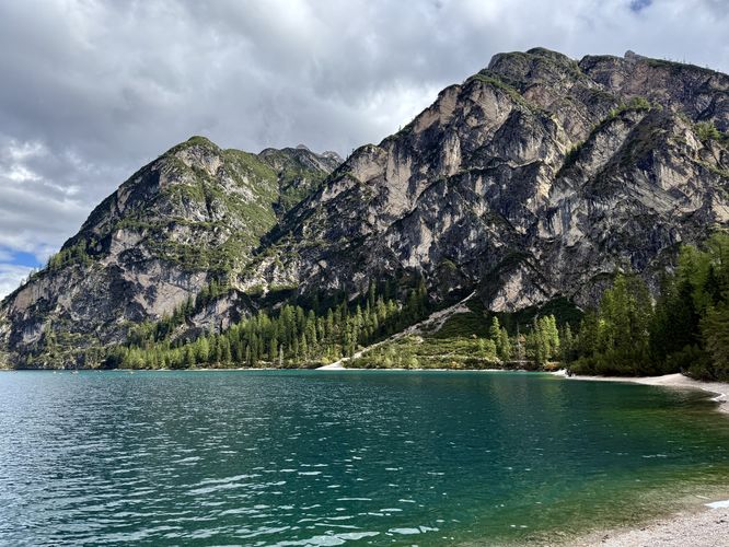 Towering Dolomites' alpine mountains surround Lake Braies