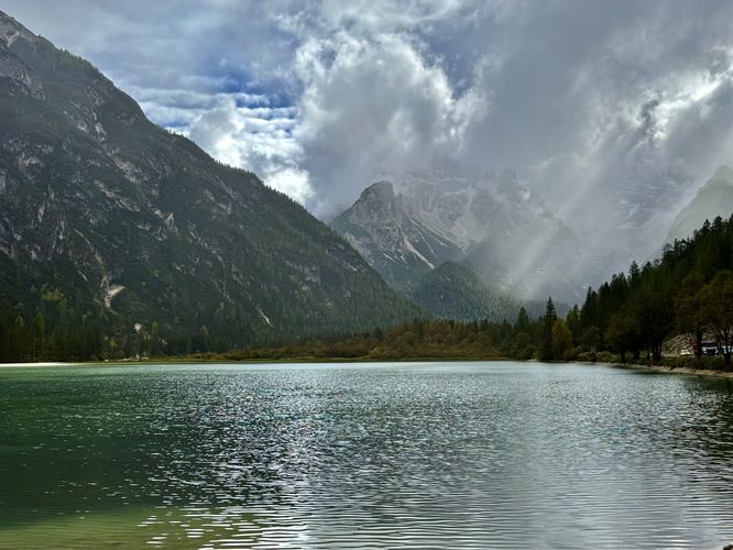Breathtaking view of Lago di Landro and the cloudy Monte Cristallo massif