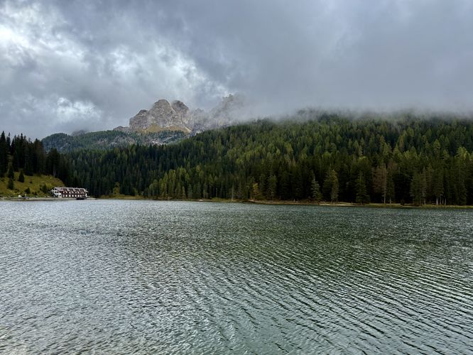 View of alpine peaks, Lake Misurina, and Quinz Locanda al Lago restaurant