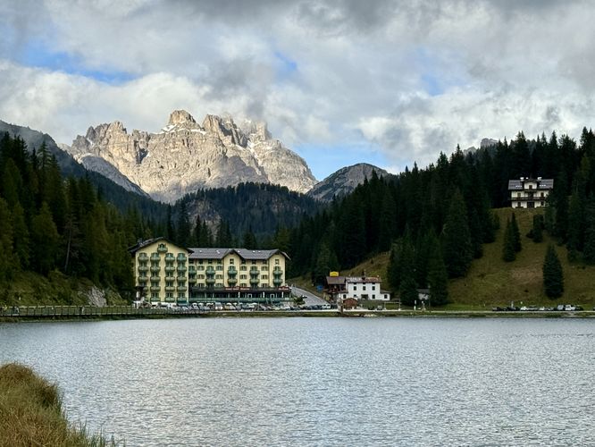 View of Grand Hotel Misurina and towering alpine peaks of the Dolomites
