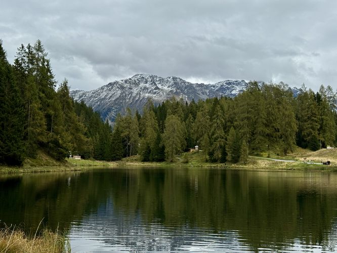 Alpine peaks tower over Schwarzsee