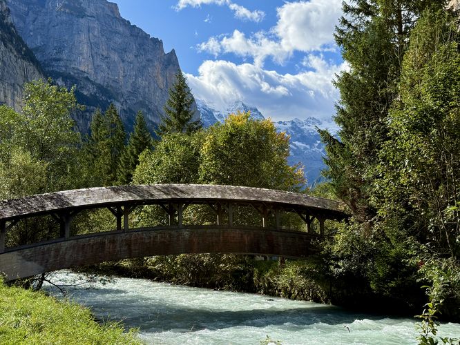 Scenic bridge spans the White Lutschine river