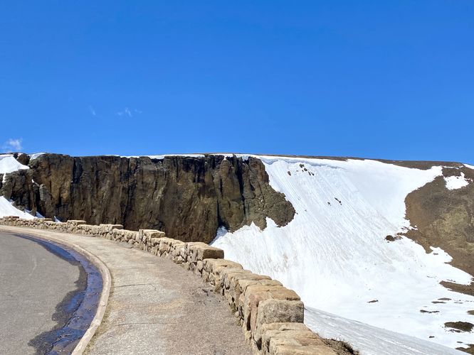 View of the sidewalk and lava cliffs