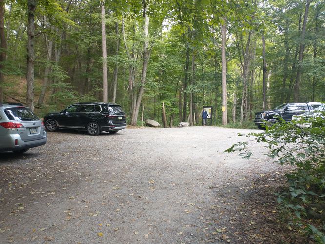 Parking area near the trailhead. The Information kiosk can be seen at the far end of the lot nearest the trail.