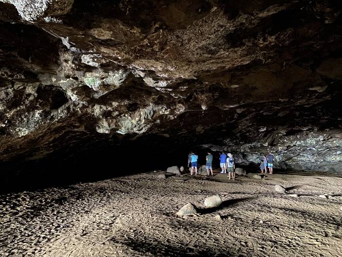 The dark abyss of the Maniniholo Dry Cave on Kauai