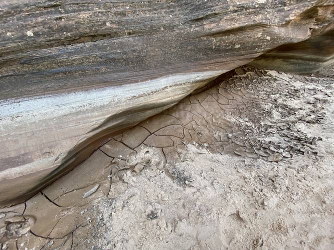 Semi-dried mud, starting to crack. In the slot canyon