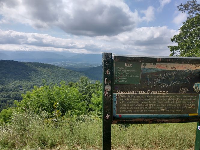 The view from the Overlook with a graffiti filled information plaque.