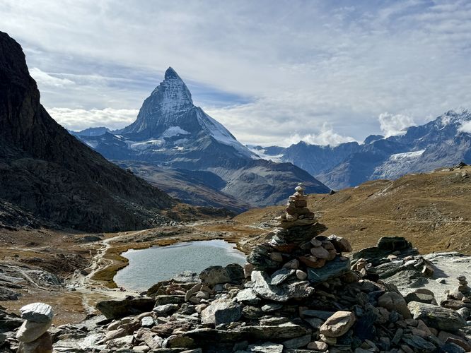 View of Riffelsee, the Matterhorn, from a rock cairn viewpoint
