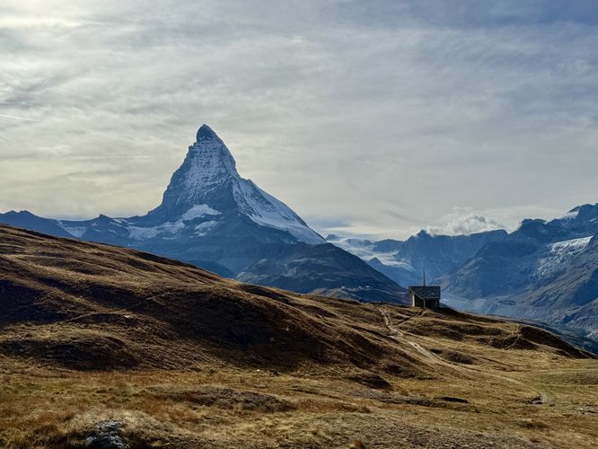View of the Matterhorn with a small church in the foreground
