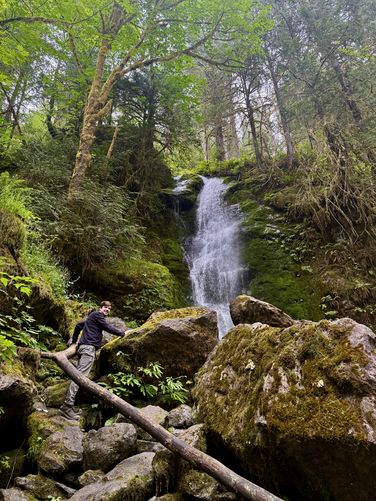 Scrambling up to the base of Merriman Falls
