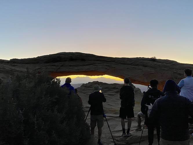 Photographers at Mesa Arch waiting for sunrise