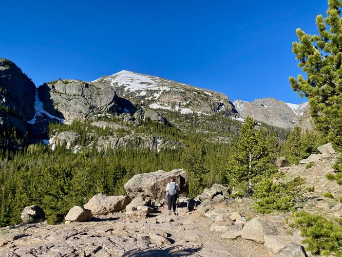 Hiking along the Glacier Gorge Trail with views of Thatchtop Mountain
