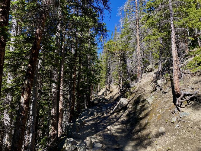 Hiking up the Sky Pond Trail to reach The Loch
