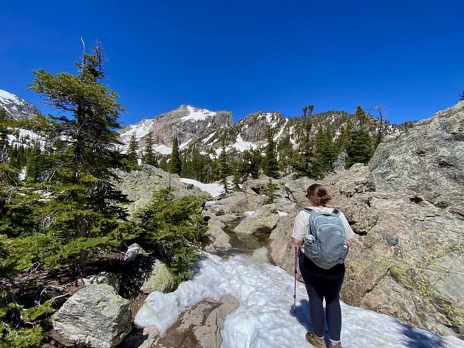 Overflow water with boulder scrambles lead to Lake Haiyaha
