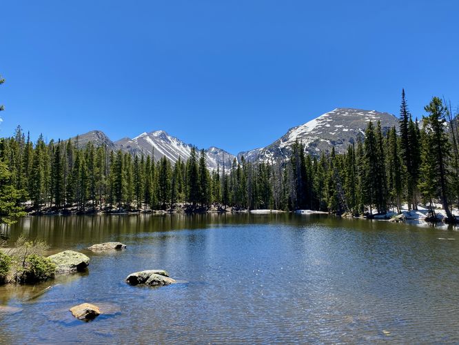 View of Nymph Lake with Half Mountain, Storm Peak, and Thatchtop Mountain