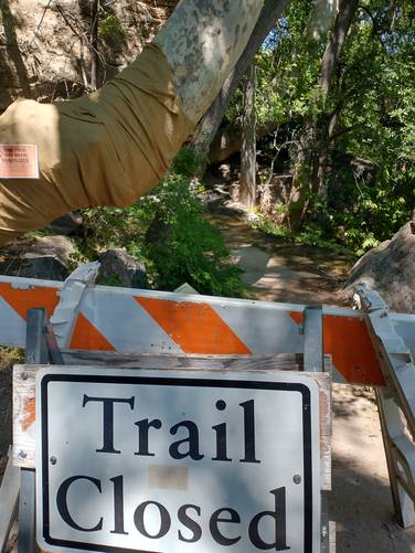 Trail closure due to flooded trail