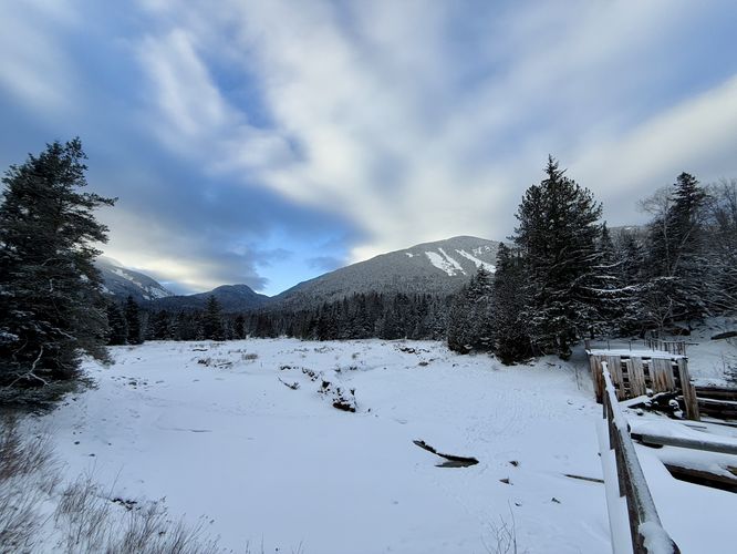 View of Wright Peak and its Angel Slides from Marcy Dam (east)