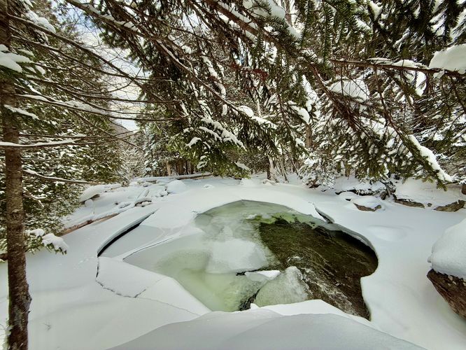 Scenic frozen pool in Phelps Brook