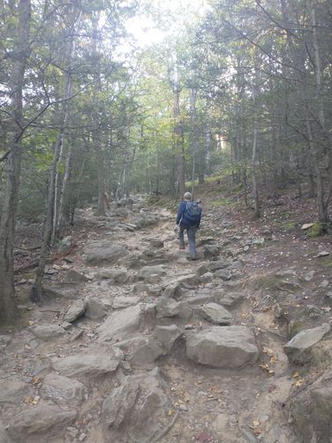 Watch your step up the steep rocky trail