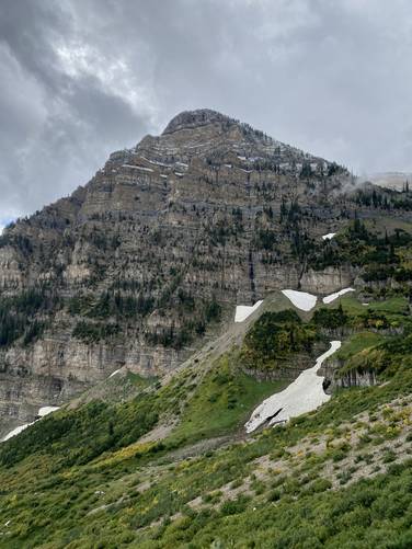 Stunning view of snowfields and rocky peaks along the Mt. Timpanogos Trail