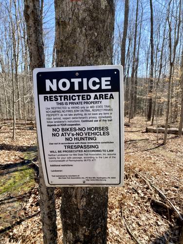 Stay on-trail, this is private property that allows hikers