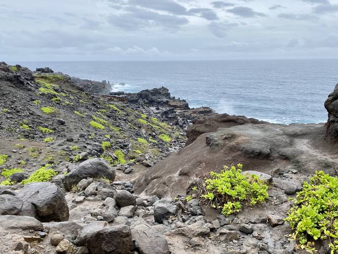 Hiking down the lava rocks, boulders, and mud to reach the  Nakalele Blowhole