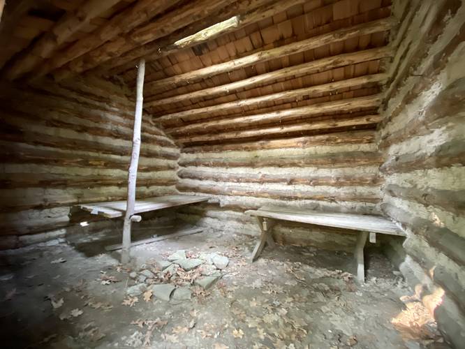 Inside a small home at the replica Native American village
