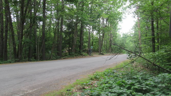 Parker Road Trail head is to the right and down less than 100 yards.