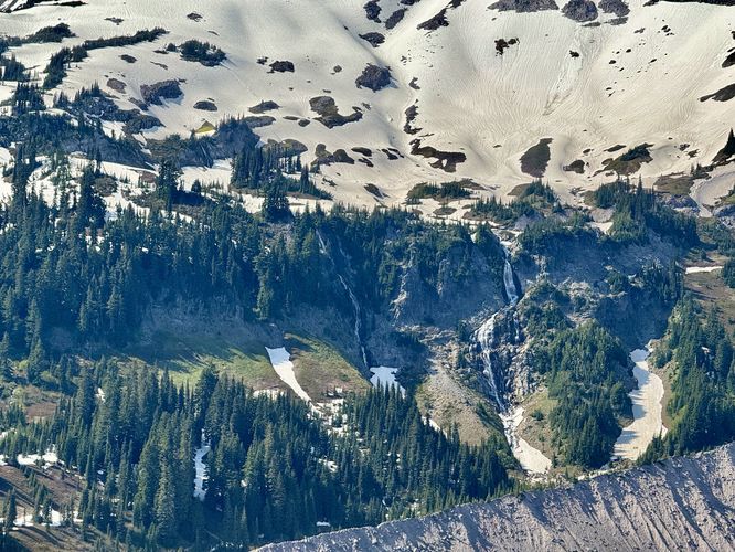 Series of waterfalls spill down from Mt. Rainier's snow and glacier fields