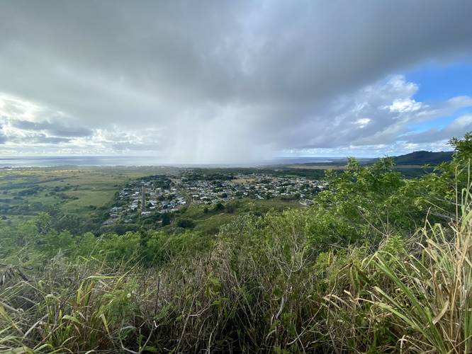 View of Wailua, HI (Kauai) with a rainstorm dropping precipitation