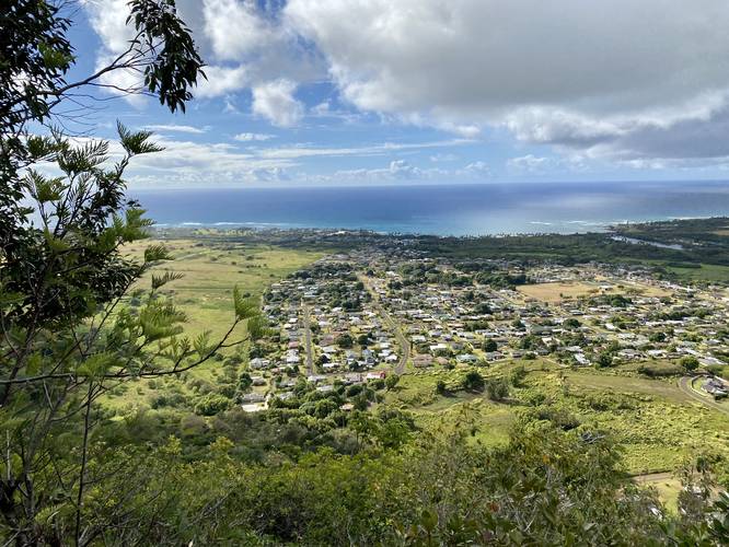 View of Wailua, HI (Kauai) with beautiful blue and turquoise pacific ocean and sunlight reflection on water
