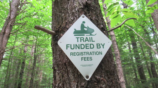 Snowmobilers help fund the trail
