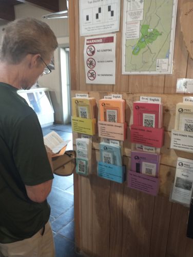 Trail maps available inside and outside in English and Spanish